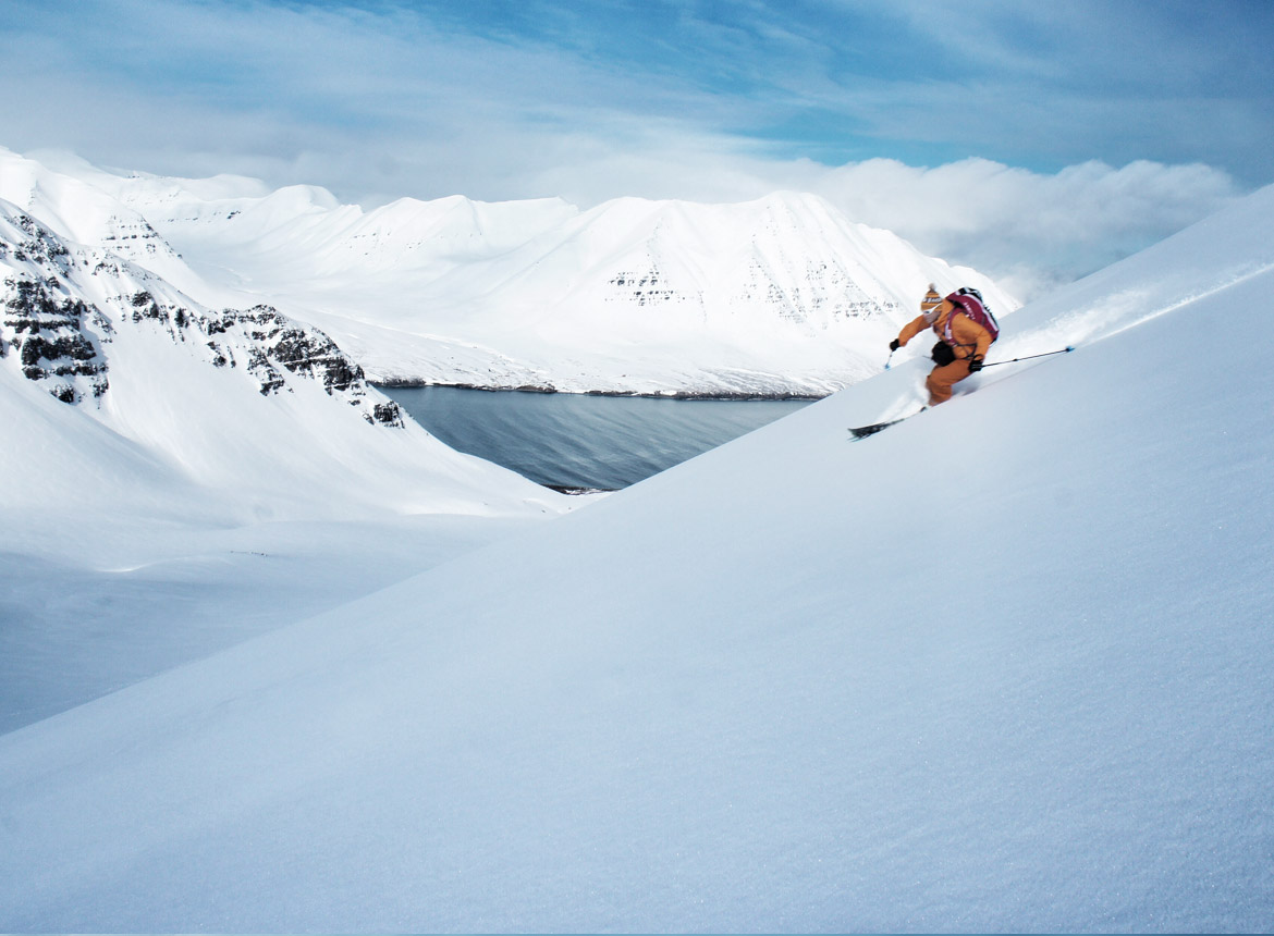 Ski guide Sigi Rumpfhuber opens a line above Iceland's Olafsfjord